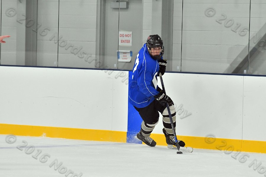 Wheaton College Men\'s Ice Hockey vs Middlesex Community College. - Photo By: KEITH NORDSTROM